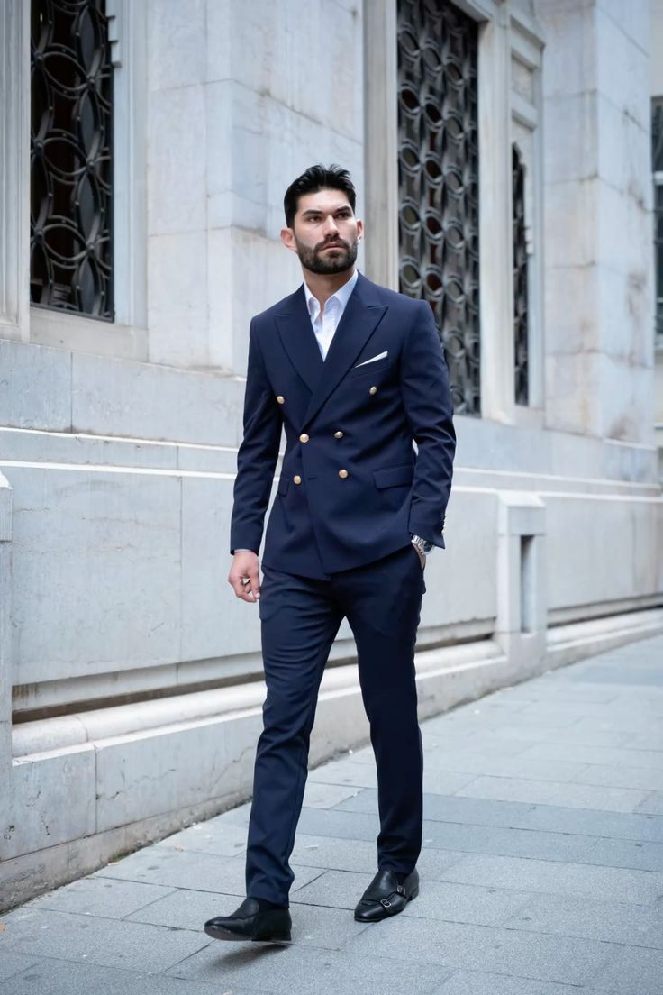 Classic black suit with white shirt and polished black oxford shoes